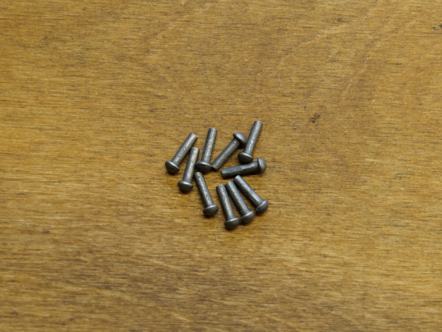 Ten 1/8" x 1/2" Round Button Head Rivets (Mild Steel)