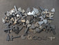 Lot 31: Stainless steel pendant and keychain blanks (110 pieces)